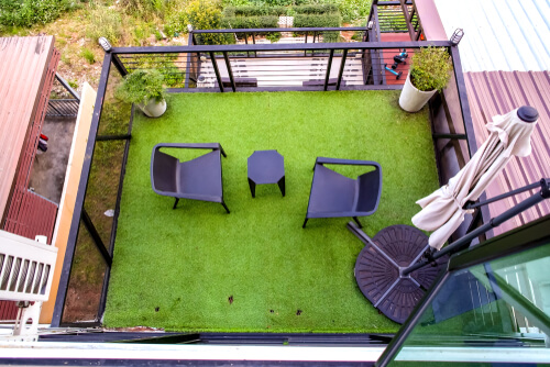 Balcony Grill Designs Using Artificial Grass