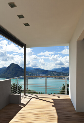 Luxurious balcony railing design with a sunset view
