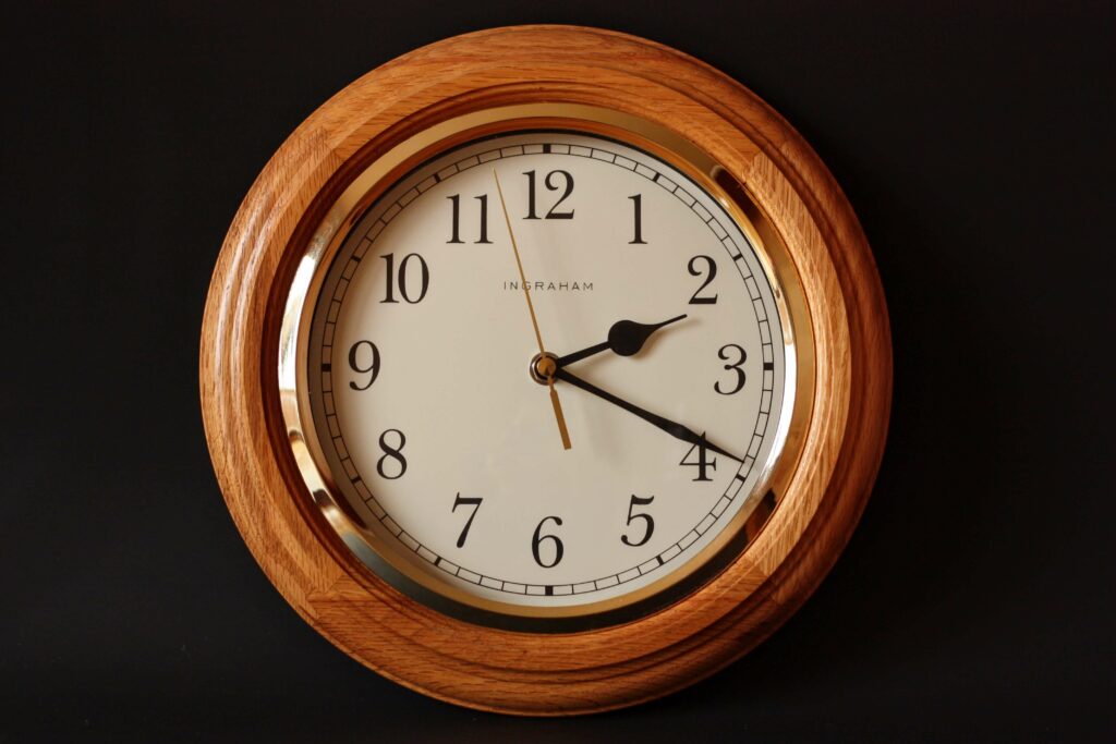 a wooden wall clock